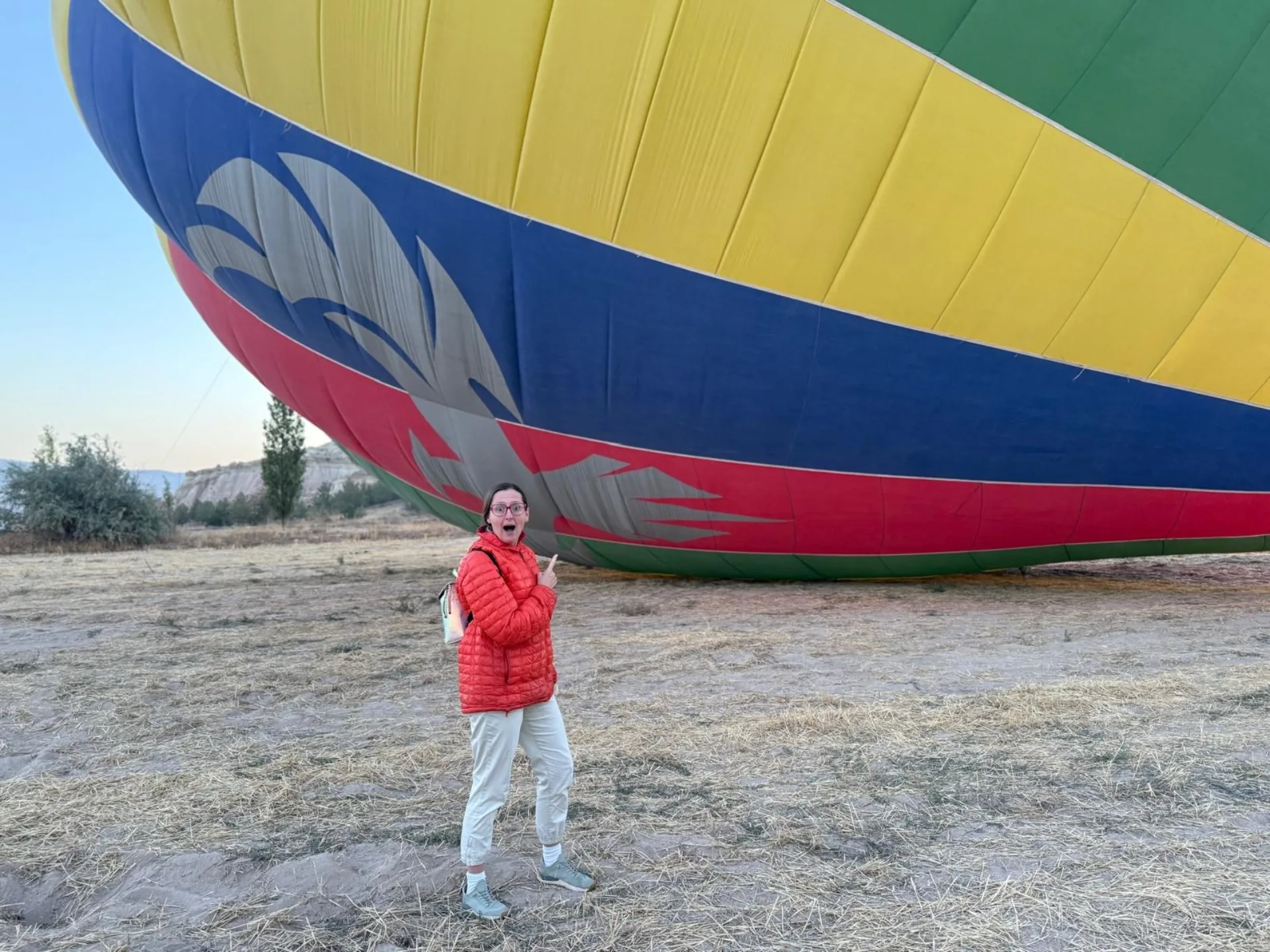 Hot air balloons floating above Cappadocia's fairy chimneys at sunrise